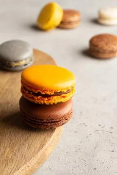 Multicolored macarons macaroon on a light gray background Stock Photos