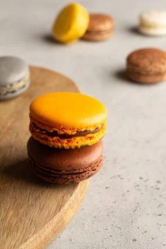 Multicolored macarons macaroon on a light gray background Stock Photos