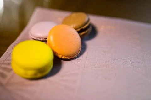 Multicolored macaroon cookies on a table Stock Photos