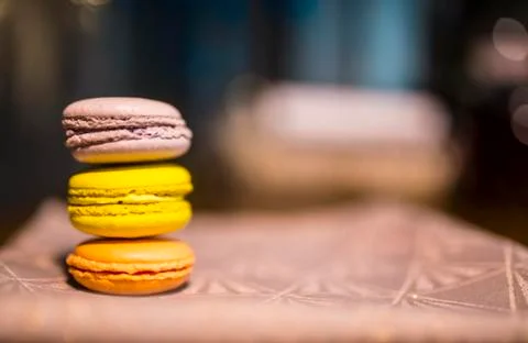 Multicolored macaroon cookies on a table Stock Photos