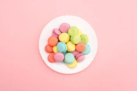 Multicolored macaroons on a plate Stock Photos
