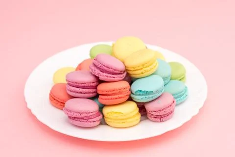 Multicolored macaroons on a plate Stock Photos