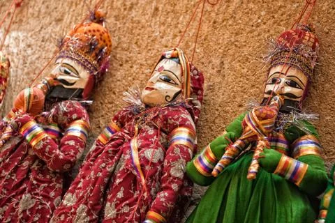 Multicolored marionettes Stock Photos