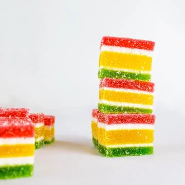 Multicolored marmalade in a stack on a white background Stock-Fotos