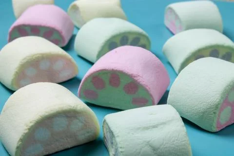 Multicolored marshmallows on a blue background Foto stock