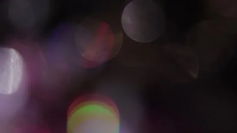 Multicolored moving bokeh in black 스톡 동영상 318673140