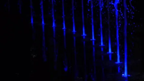 Multicolored night dancing fountain Stock Footage 74065352