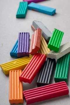 Multicolored object plastic, sticks of plasticine. Mix of scattered clay Stock Photos