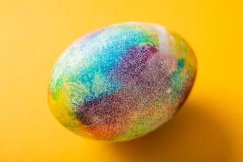 Multicolored one decorated Easter egg Stock Photos