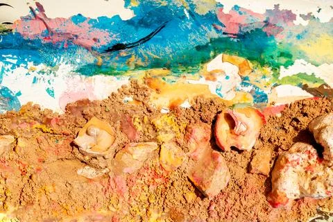 Multicolored paint and shells on the old cracked surface. The beautiful bac.. Stock Photos