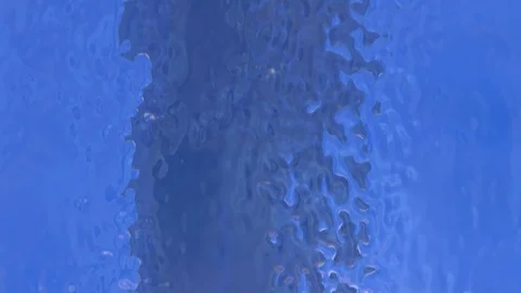 Multicolored paint in blue tones flowing down wall / screen (FULL HD) Stock Footage 110813010