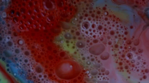 Multicolored paint bubbles and mixed. Video Stockbeeldmateriaal 122317593