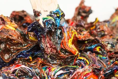 Multicolored paint paste on a white background in a close up view Stock Photos