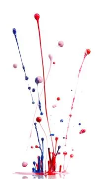 Multicolored paint splashing Stock Photos