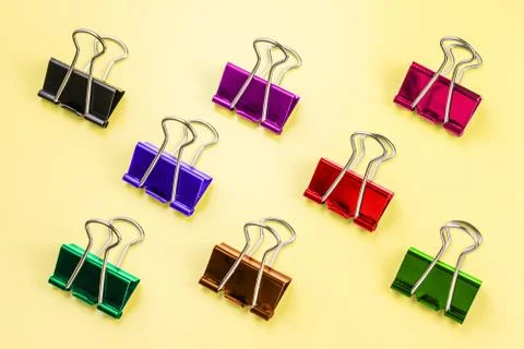 Multicolored paper clips in the stack Stock Photos