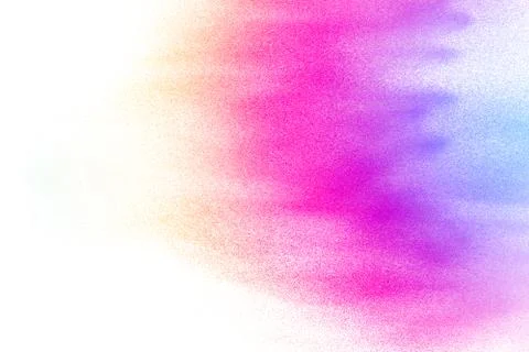 Multicolored particles explosion on white background. Colorful dust splatter. Stock Photos