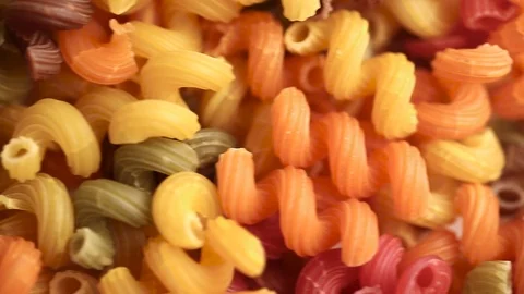 Multicolored pasta as background Stock Footage 95128254