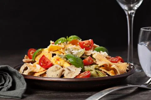 Multicolored pasta on dark background Stock Photos