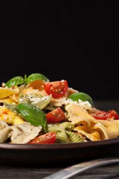 Multicolored pasta on dark background Stock-Fotos