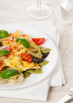 Multicolored pasta on light background Stock Photos