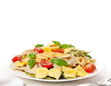 Multicolored pasta on light background Stock Photos