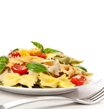 Multicolored pasta on light background Stock Photos