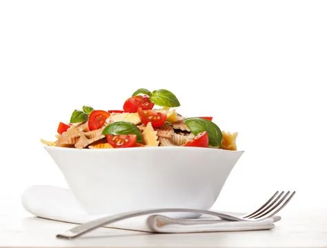 Multicolored pasta on light background Stock Photos