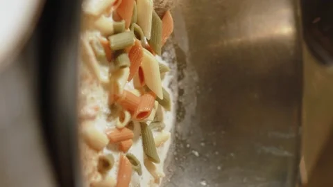 Multicolored paste. Slow motion. 120 fps. Vertical video Stock Footage 172439973