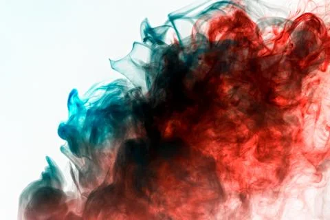 Multicolored pattern of the smoke of the green and red colors of the mystical Stock Photos
