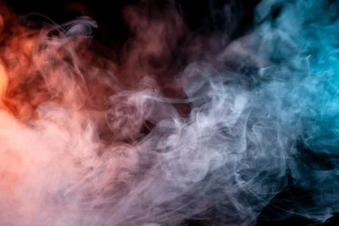 Multicolored pattern of the smoke of the pink, blue and red colors of the mys Stock Photos