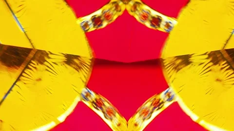 Multicolored patterns in a rotating kaleidoscope Stock Footage 132296996