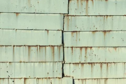 Multicolored peeling wall texture and background. Surface with brush stroke.. Stock Photos