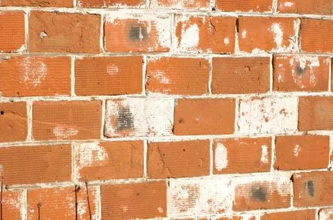 Multicolored peeling wall texture and background. Painted brickwork. Stock Photos