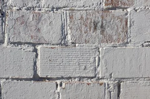 Multicolored peeling wall texture and background. Painted brickwork. Stock Photos