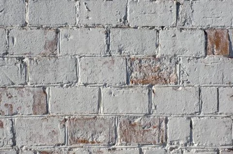 Multicolored peeling wall texture and background. Painted brickwork. Foto stock