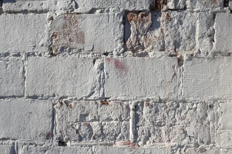 Multicolored peeling wall texture and background. Painted brickwork. Stock Photos