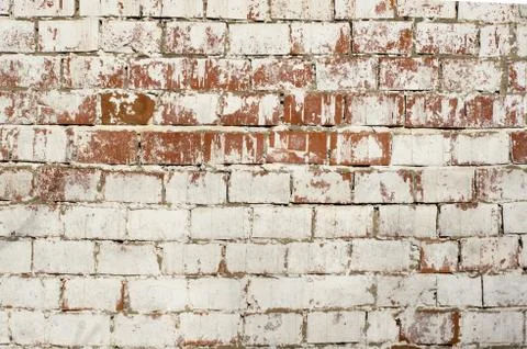Multicolored peeling wall texture and background. Painted brickwork. Stock Photos