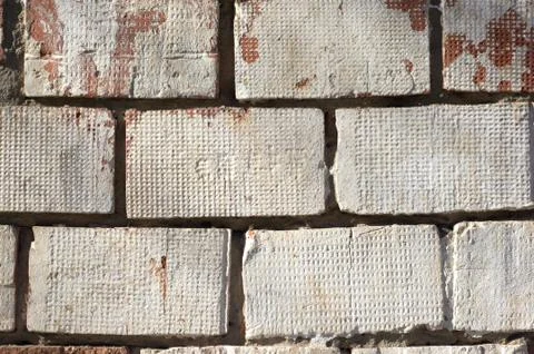 Multicolored peeling wall texture and background. Painted brickwork. Stock Photos