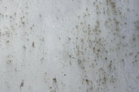 Multicolored peeling wall texture and background. Surface with stains. The .. Stock Photos