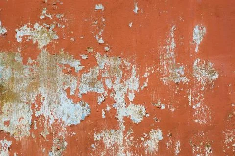 Multicolored peeling wall texture and background. Surface with stains. Stock Photos