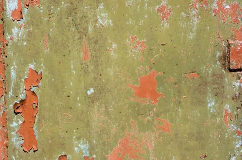Multicolored peeling wall texture and background. Surface with stains. Stock Photos