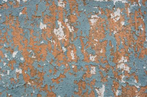 Multicolored peeling wall texture and background. Surface with scratches, sta Stock Photos
