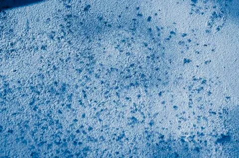 Multicolored peeling wall texture and background. Surface with pimples, stain Stock Photos
