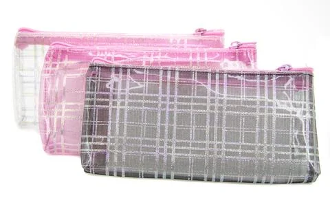 Multicolored pencil pen case container isolated on the white background Stock Photos
