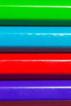 Multicolored pencils background Stock Photos