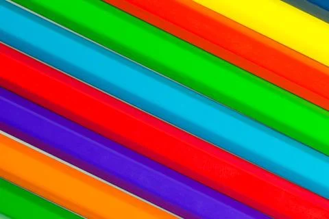 Multicolored pencils background Stock Photos