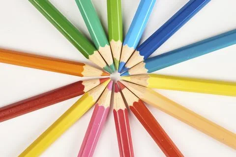 Multicolored pencils background Stock Photos