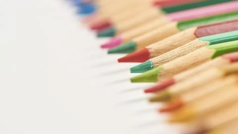 Multicolored pencils background Stock Photos