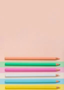 Multicolored pencils lined up on a multicolored background. Stock Photos