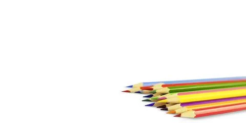 Multicolored pencils on a white background with copy space. Stock Photos